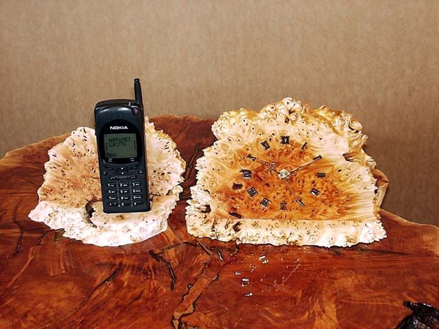 Mobile phone rack and table clock
